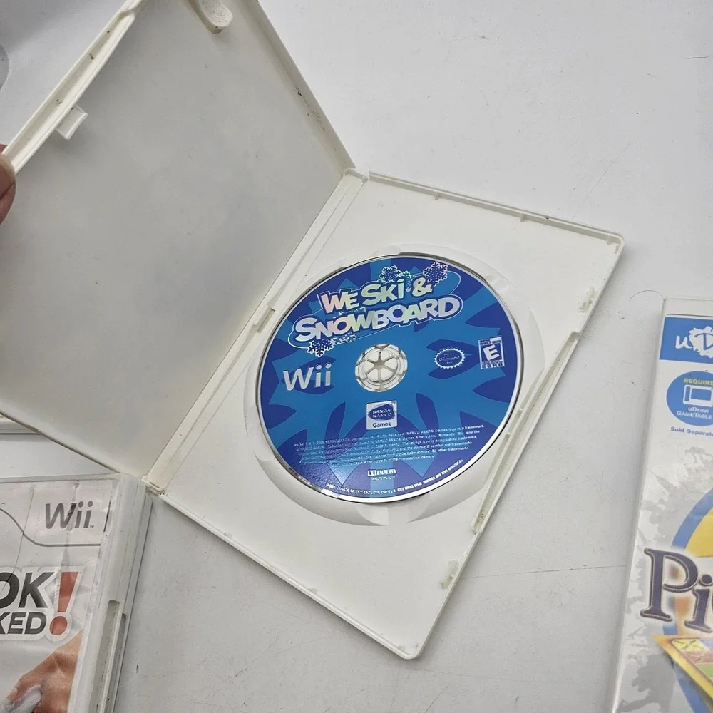 Nintendo Wii 12 Game Lot Pictionary Family Game Night Tony Hawk Guitar Hero